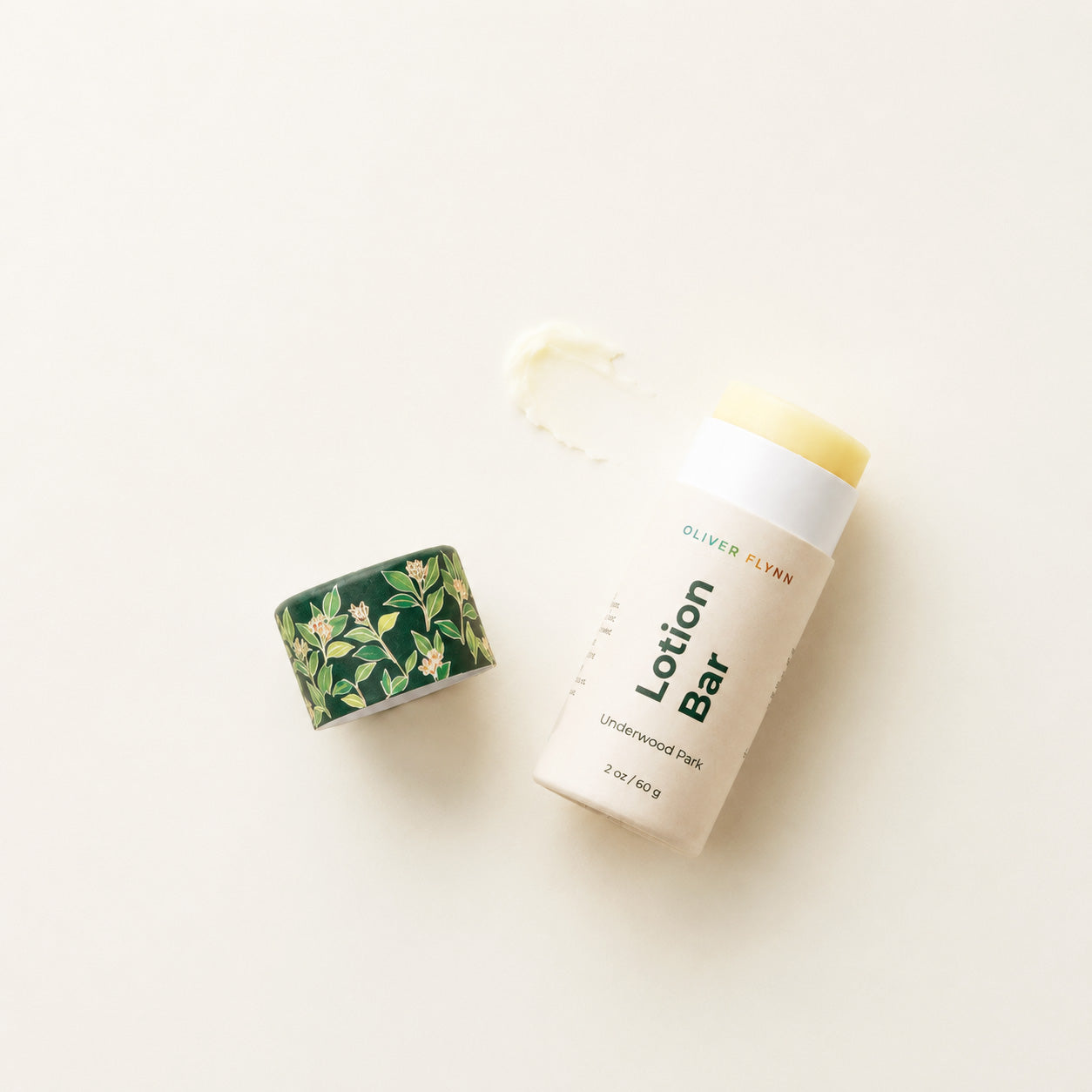 Oliver Flynn Underwood Park Lotion Bar with mango butter and jojoba oil provides silky, non-greasy moisture for dry skin. Handcrafted in small batches in Brooklyn and packaged in a plastic-free, compostable paper push-up tube, it is an eco-friendly and travel-friendly solid moisturizer.