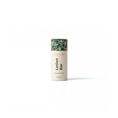 Oliver Flynn Underwood Park Lotion Bar with mango butter and jojoba oil provides silky, non-greasy moisture for dry skin. Handcrafted in small batches in Brooklyn and packaged in a plastic-free, compostable paper push-up tube, it is an eco-friendly and travel-friendly solid moisturizer.