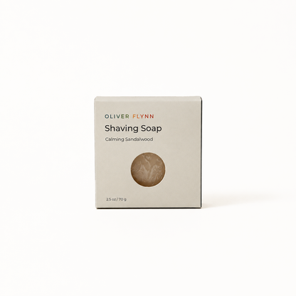 Oliver Flynn Calming Sandalwood Shaving Soap with a rich, easy-to-build lather for a gentle, smooth shave that leaves skin feeling clean and refreshed.