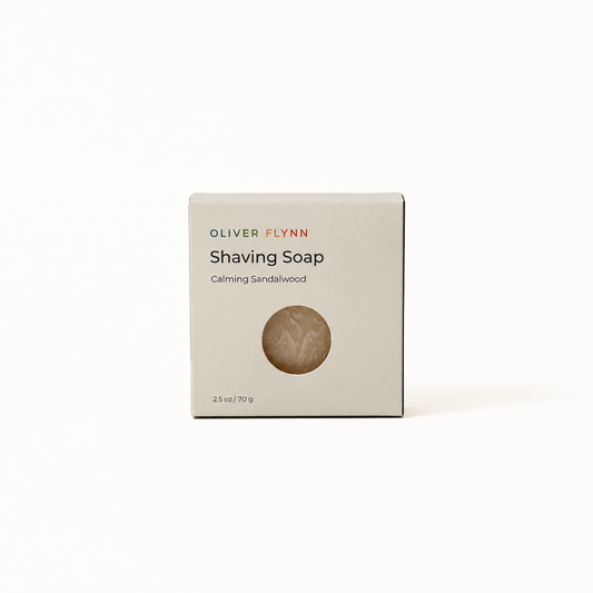 Oliver Flynn Calming Sandalwood Shaving Soap with a rich, easy-to-build lather for a gentle, smooth shave that leaves skin feeling clean and refreshed.