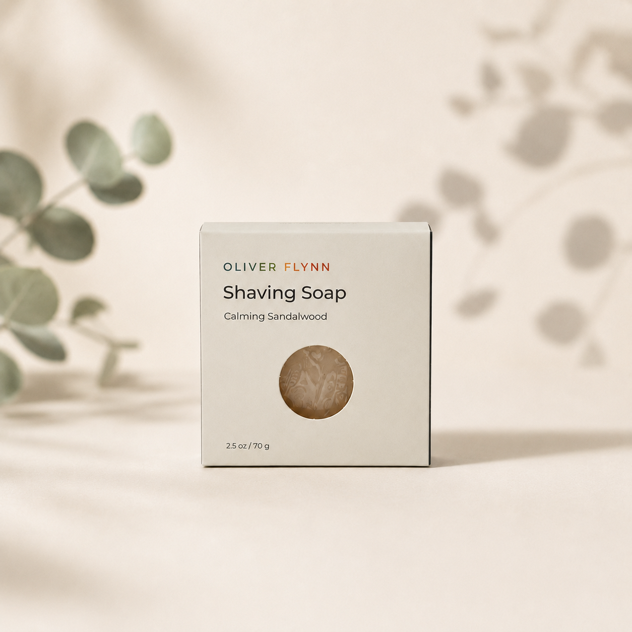 Oliver Flynn Calming Sandalwood Shaving Soap with a rich, easy-to-build lather for a gentle, smooth shave that leaves skin feeling clean and refreshed.