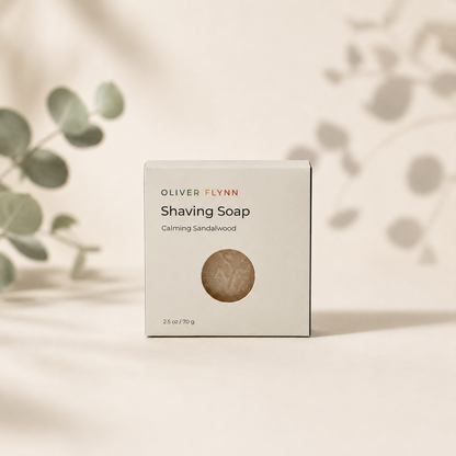 Oliver Flynn Calming Sandalwood Shaving Soap with a rich, easy-to-build lather for a gentle, smooth shave that leaves skin feeling clean and refreshed.